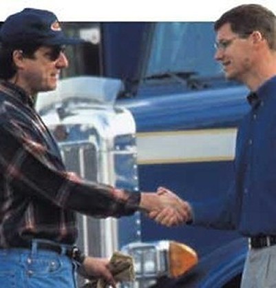 Trucker and a Man Shaking Hands